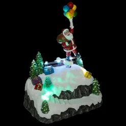 FEERIC LIGHTS Scène de vie illuminée et animée (H22 cm) Envol du Père Noël